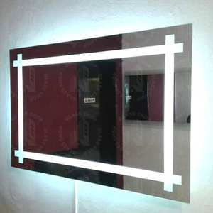 Espejo de 6mm compuesto por cenefa de Esmerilado y luz LED por M2